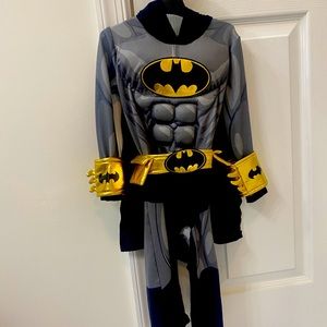 Muscle Batman costume that includes the cape, belt and cuffs. Size 12-24 months